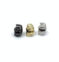 Black, gold and silver skull head beads
