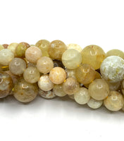 Yellow Opal Beads twisted onto each other