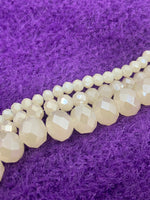 Faceted Cut Rondelle Glass beads in off white color