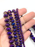 Electroplated purple glass beads