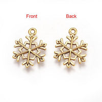 Gold and Antique Gold Alloy Snowflake Charm | Fashion Jewellery Outlet | Fashion Jewellery Outlet