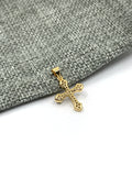 Back side of gold cross pendant