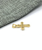 Gold cross pendant with round edges