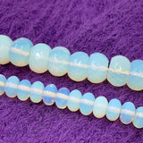 Donut faceted and smooth opalite beads