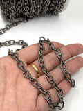 Black Rolo link chain on hand
