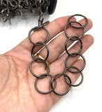 Circle link chain on hand for size reference 