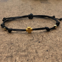 Gold Cross with Black Cord Bracelet | Fashion Jewellery Outlet | Fashion Jewellery Outlet