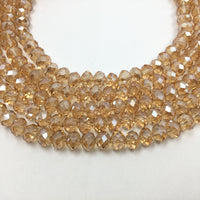 Faceted golden shadow glass beads