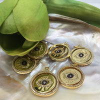 Round gold and purple evil eye charm | Fashion Jewellery Outlet | Fashion Jewellery Outlet