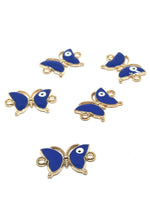 Butterfly connector charms with loops on sides. Big blue wings and gold plating on borders and back.