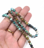 Turquoise beads on hand for reference